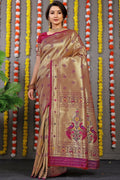 Rich wine Paithani silk saree with Zari woven embellishments and matching blouse