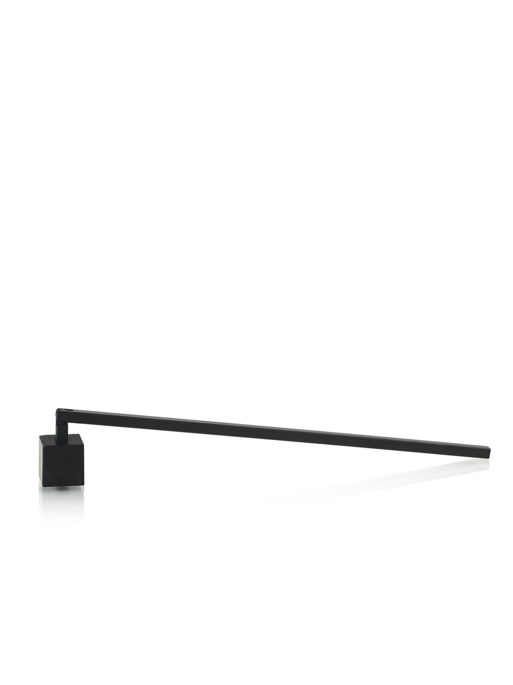 Silver metallic cube-shaped candle snuffer resting on a surface