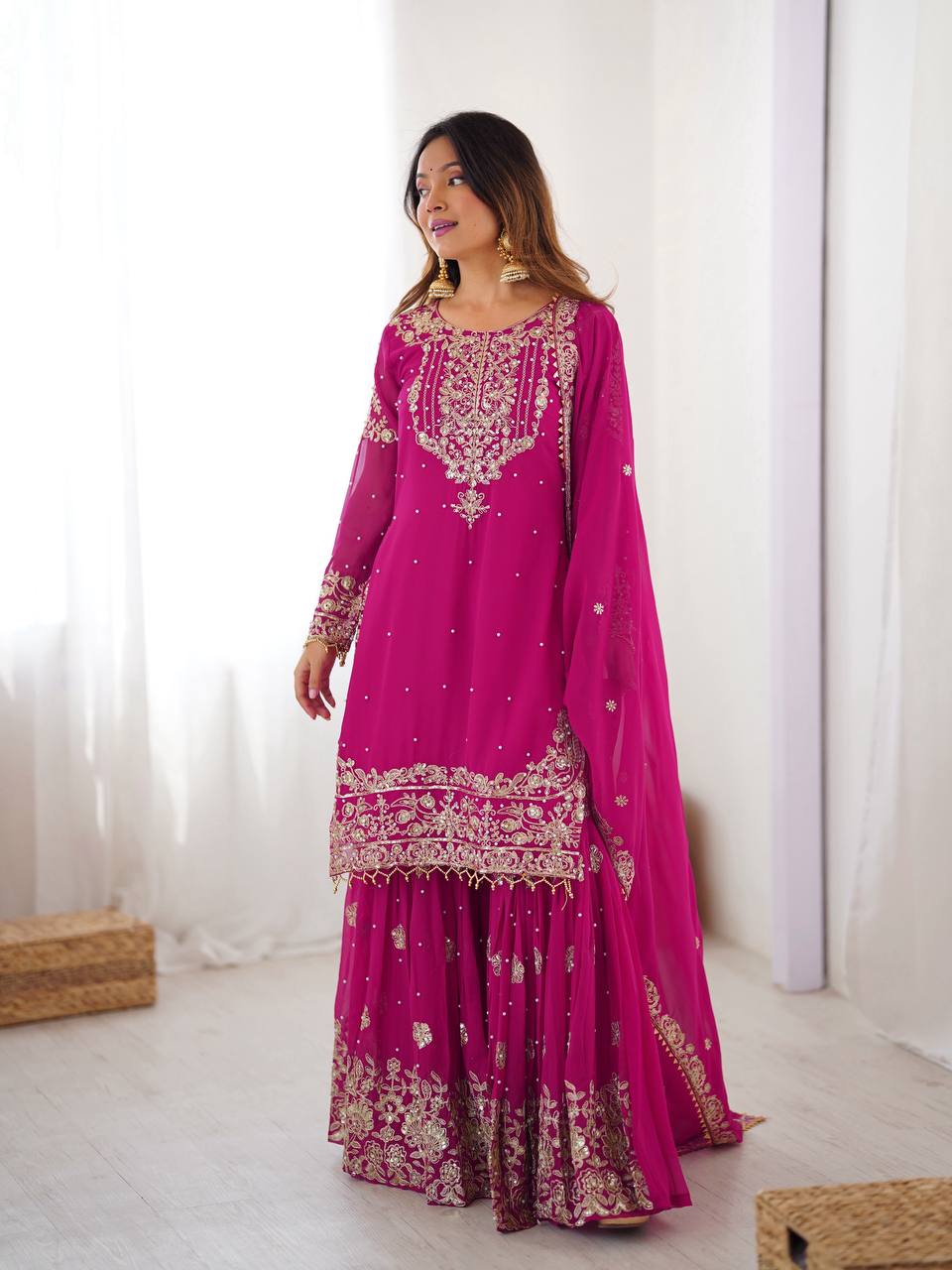 Pink faux georgette sharara suit with detailed cording, thread work, and sequins