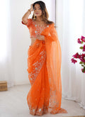 Bright orange organza silk ready-to-wear party saree with sequence embroidery.