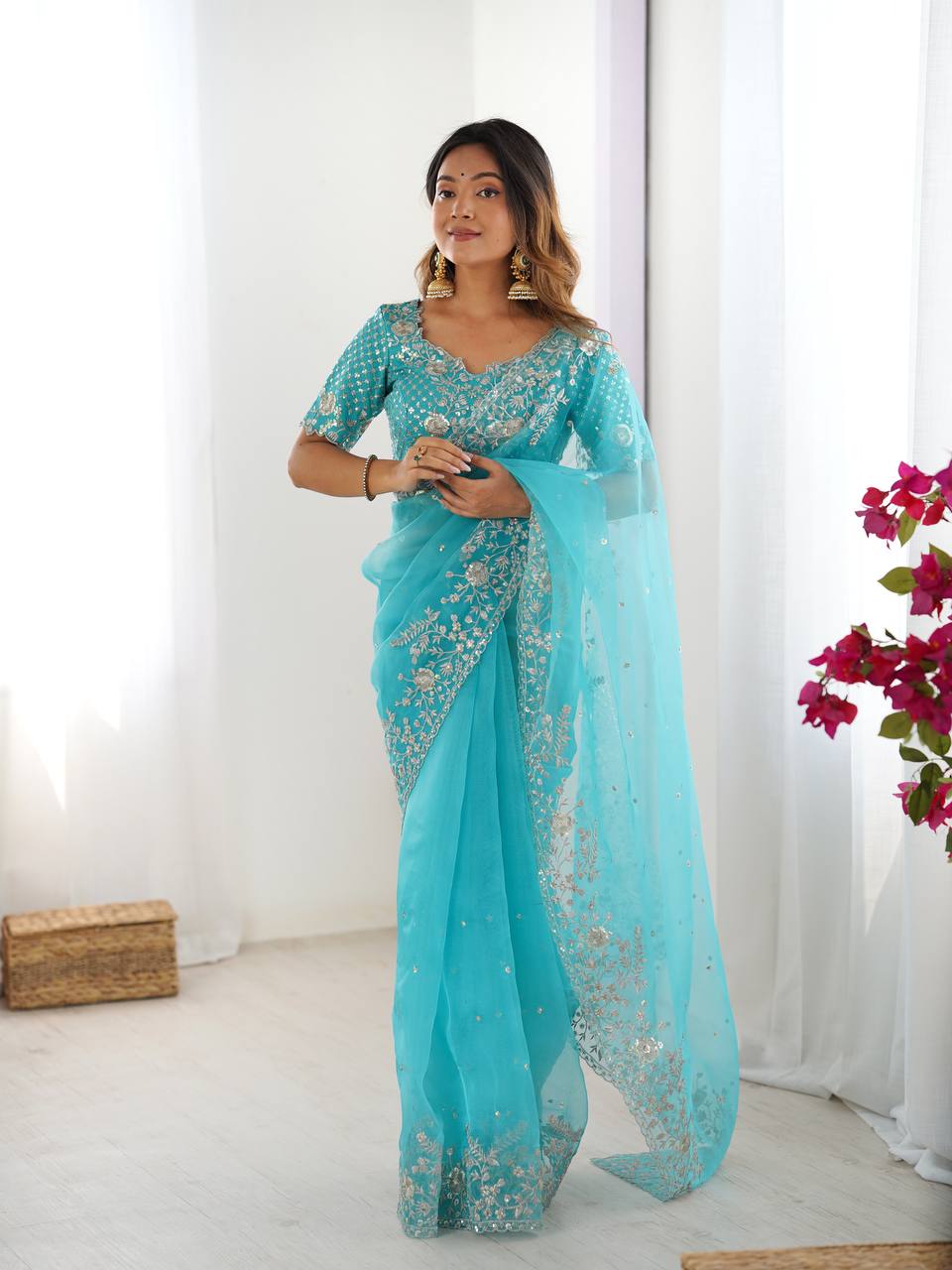 Sky blue organza silk ready-to-wear party saree with sequence embroidery.