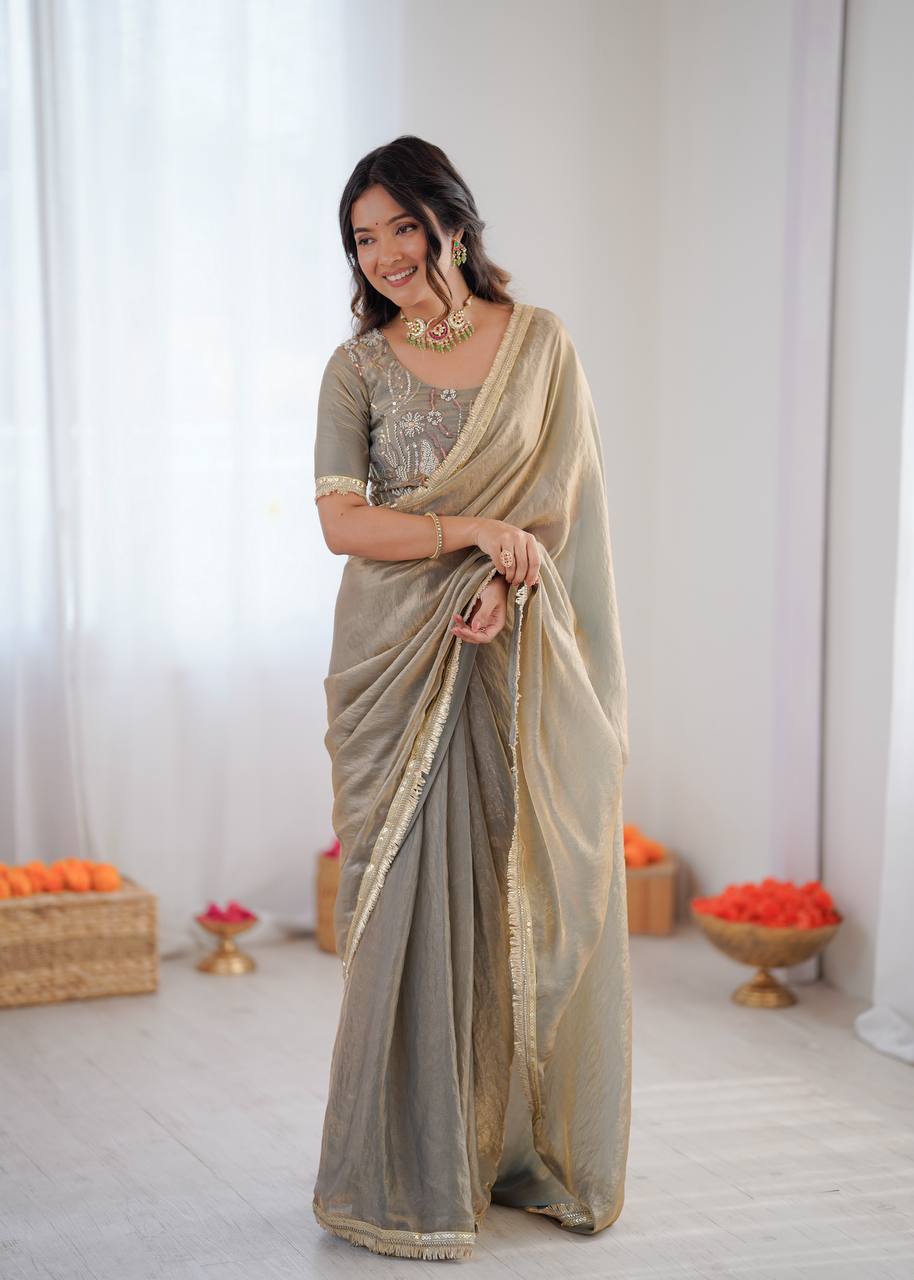 Light grey and golden shaded Fendi silk ready-to-wear saree.