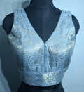 Grey Banarasi brocade saree blouse with gold and silver metallic weave detail