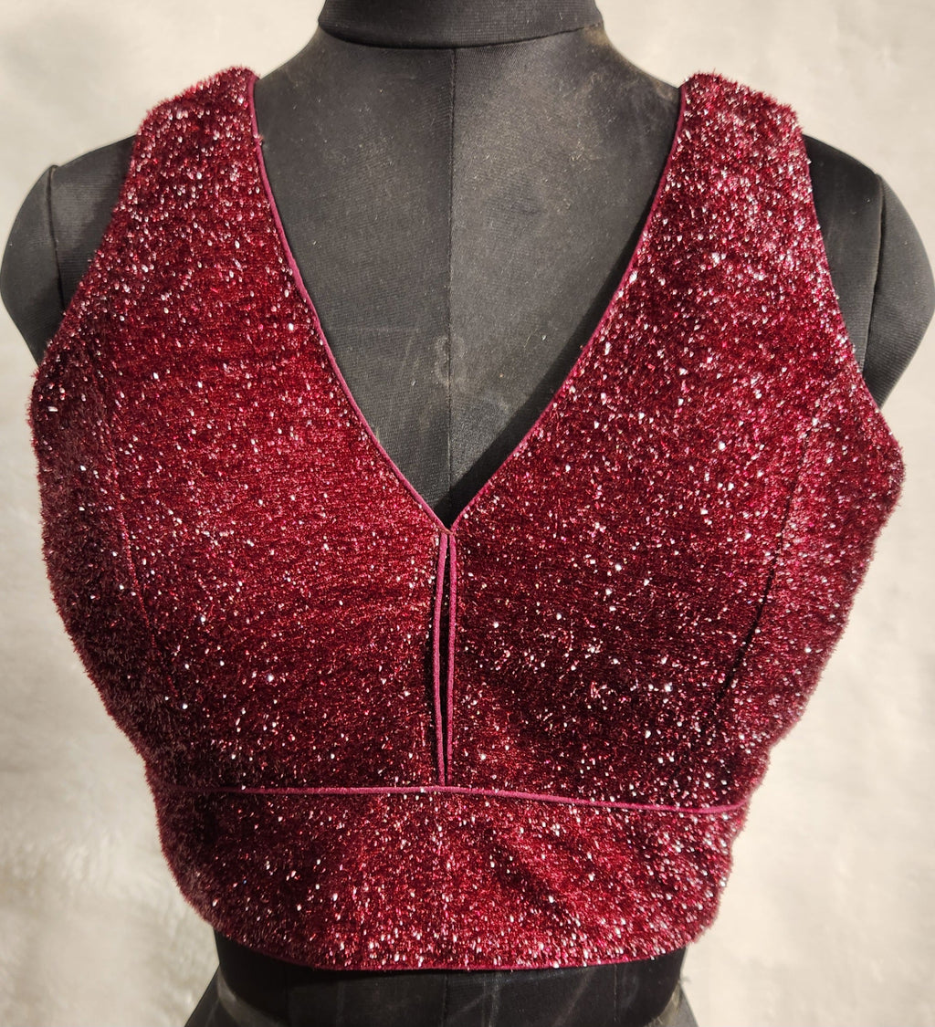 Maroon shimmery terry fabric blouse with V-neckline and back-open style