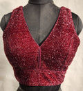 Maroon shimmery terry fabric blouse with V-neckline and back-open style
