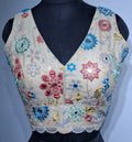 Khaki readymade blouse with multicolor mirror work and sequins, featuring a V-neck and back-open design.