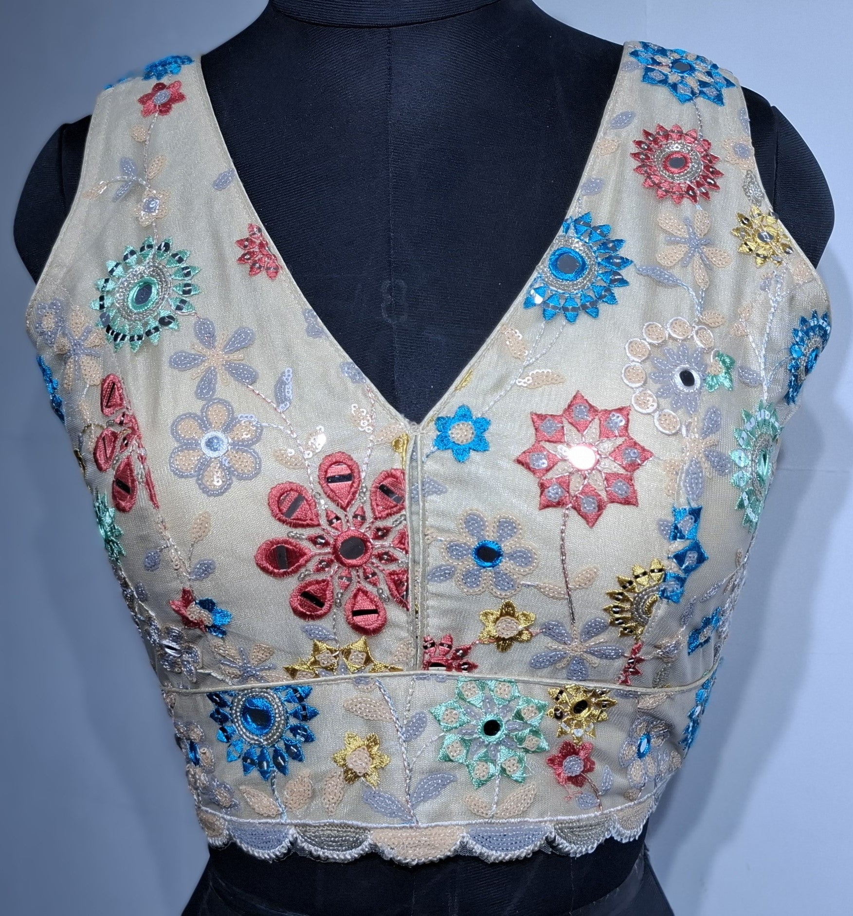 Khaki readymade blouse with multicolor mirror work and sequins, featuring a V-neck and back-open design.