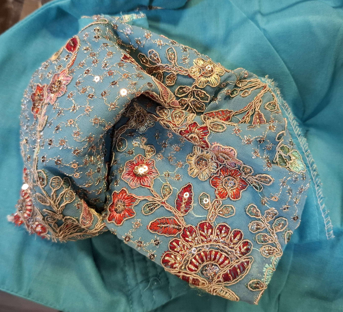 Aqua Blue Georgette Designer Blouse with Multi-Color Embroidery