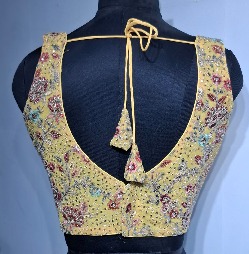 Eggyolk Yellow Georgette Blouse with Multi Color Embroidery and Sequins