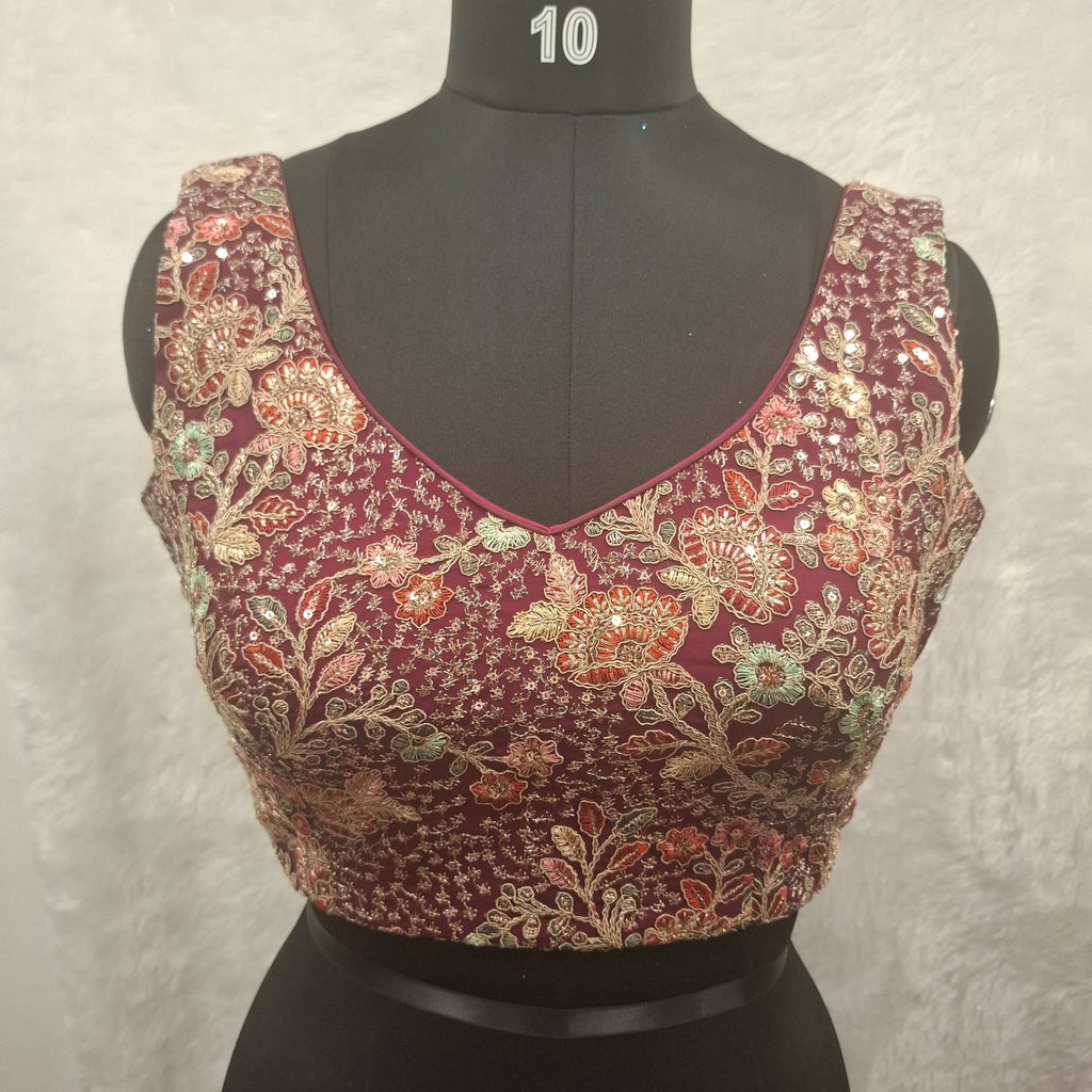 Elegant wine georgette readymade blouse with multicolor embroidery and sequin detail, back open style.