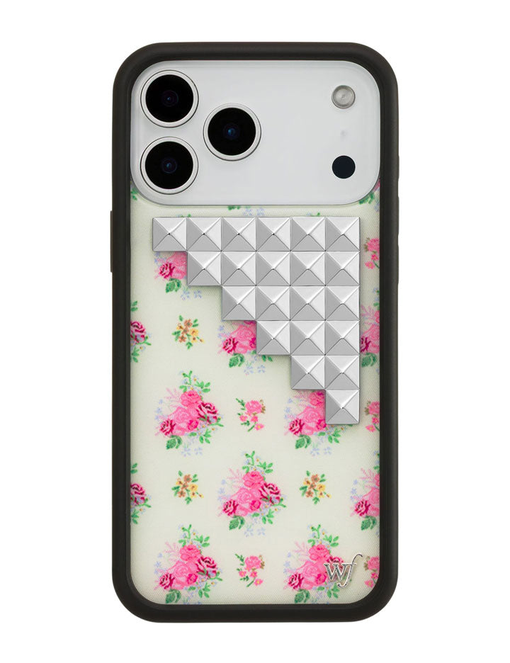 iPhone case with a soft yellow background, multi-colored floral bouquet pattern, and silver pyramid stud embellishments on a black border frame.