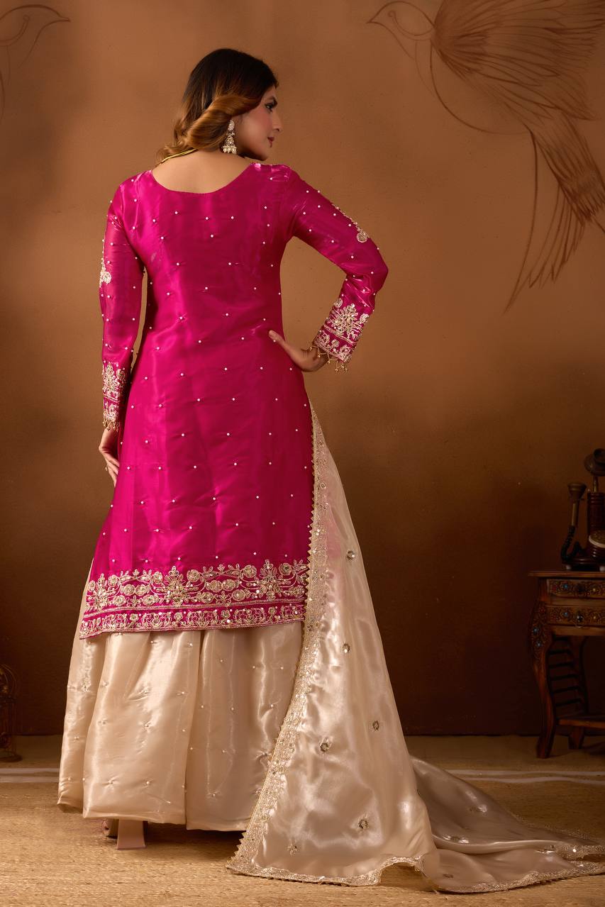 Pink Silk Embroidered Palazzo Suit with Rivet Moti Work