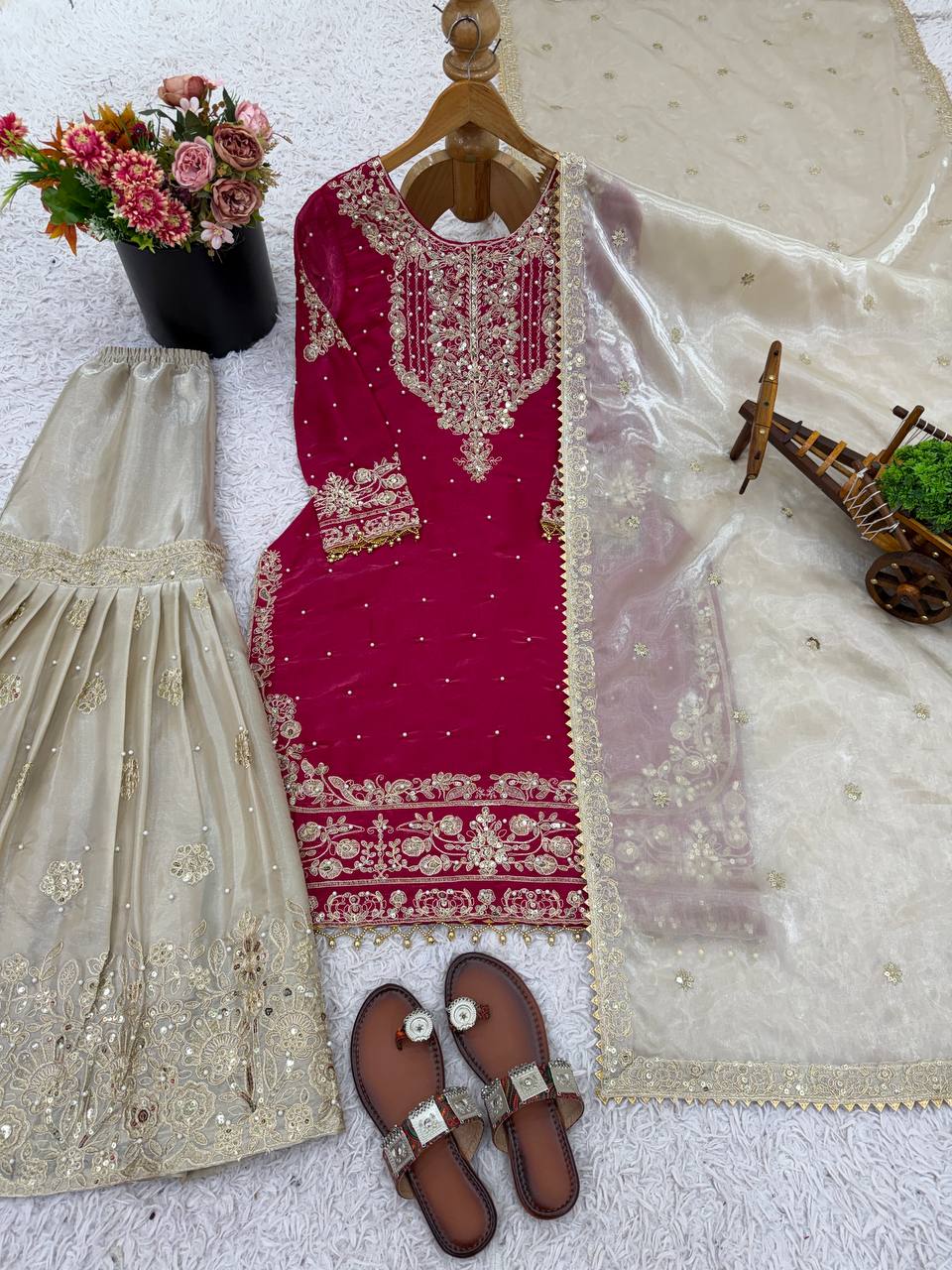 Pink Silk Embroidered Palazzo Suit with Rivet Moti Work