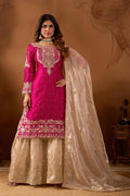 Front view of a pink Jimmy Choo silk palazzo suit with heavy embroidery and rivet moti work.