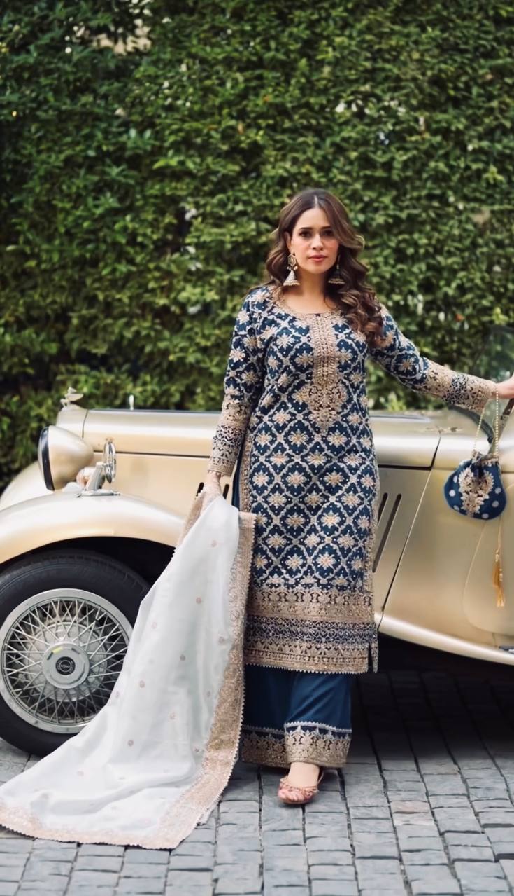 Blue faux georgette salwar suit with chain stitch embroidery, sequins, and beads work
