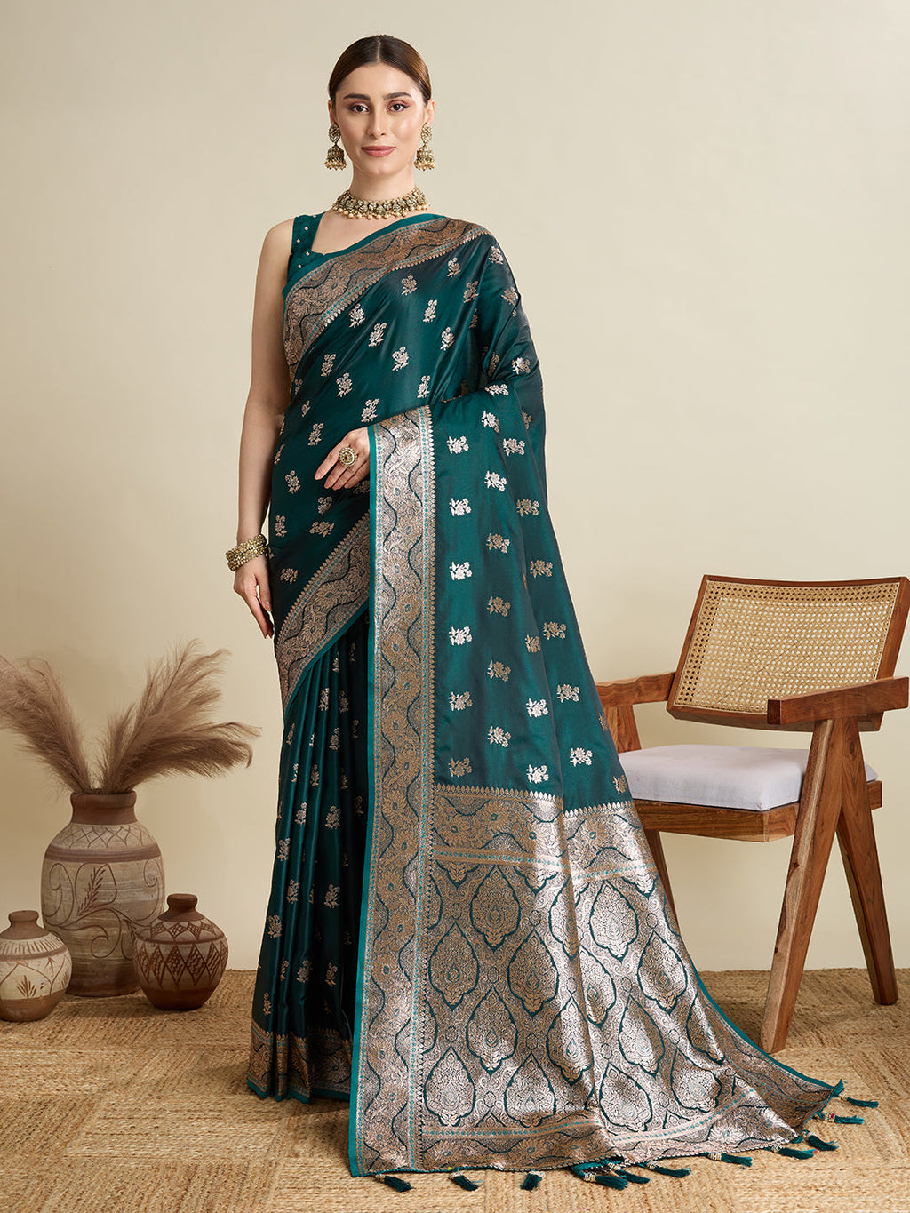 Vibrant Green satin saree with Jari motif work and included unstitched blouse piece.