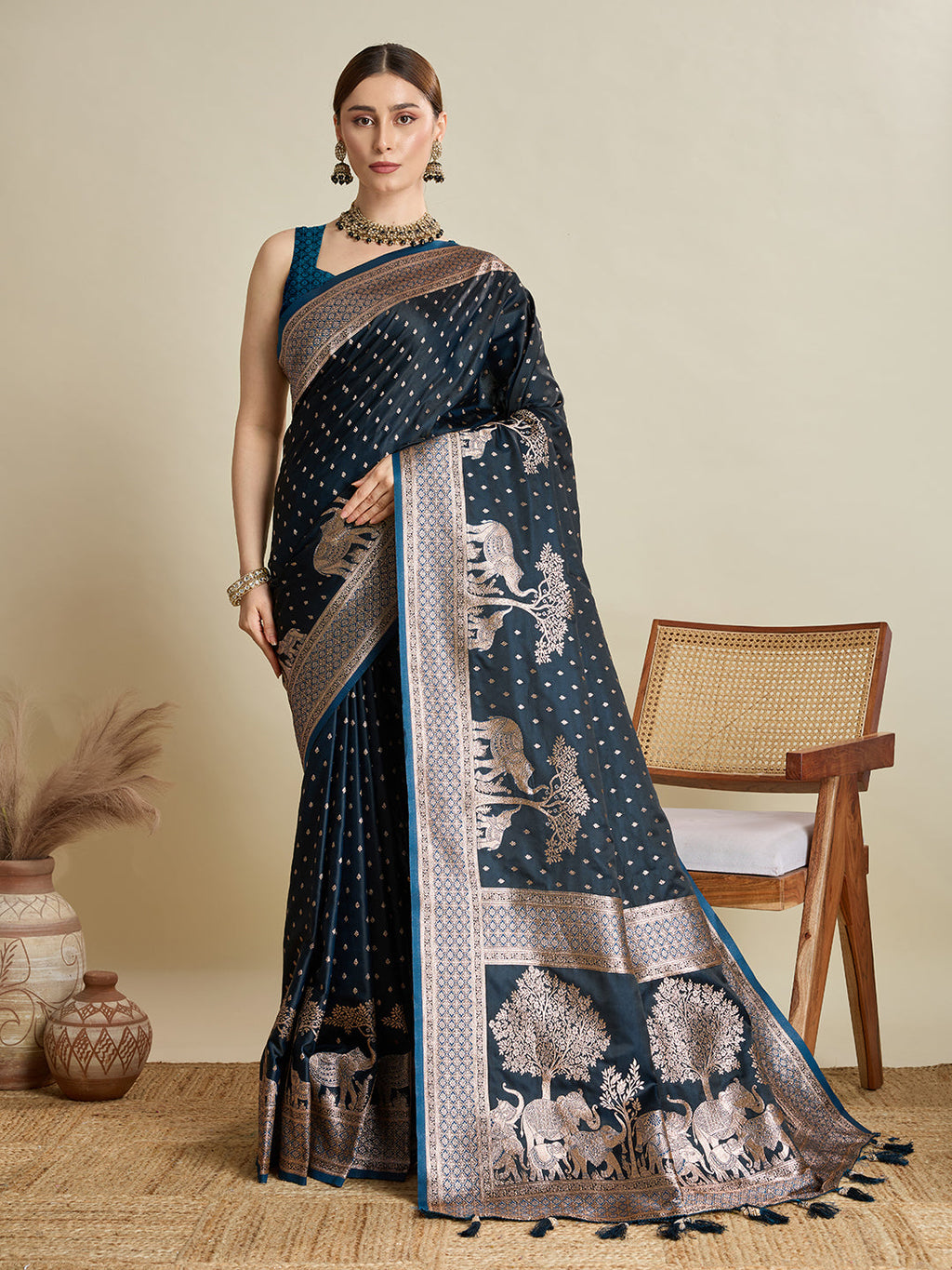 Deep Teal Green satin saree with intricate gold Jari motifs on the pallu