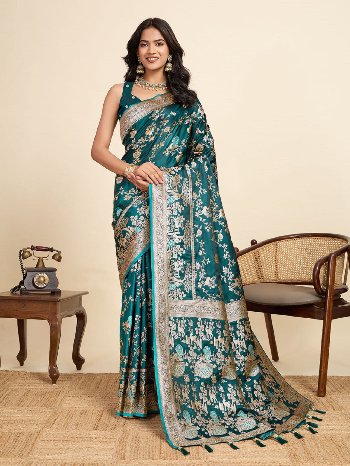 Elegant teal blue satin wedding saree with all-over jari motifs and unstitched blouse