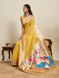 Yellow Paithani silk saree with detailed all-over jari weaving