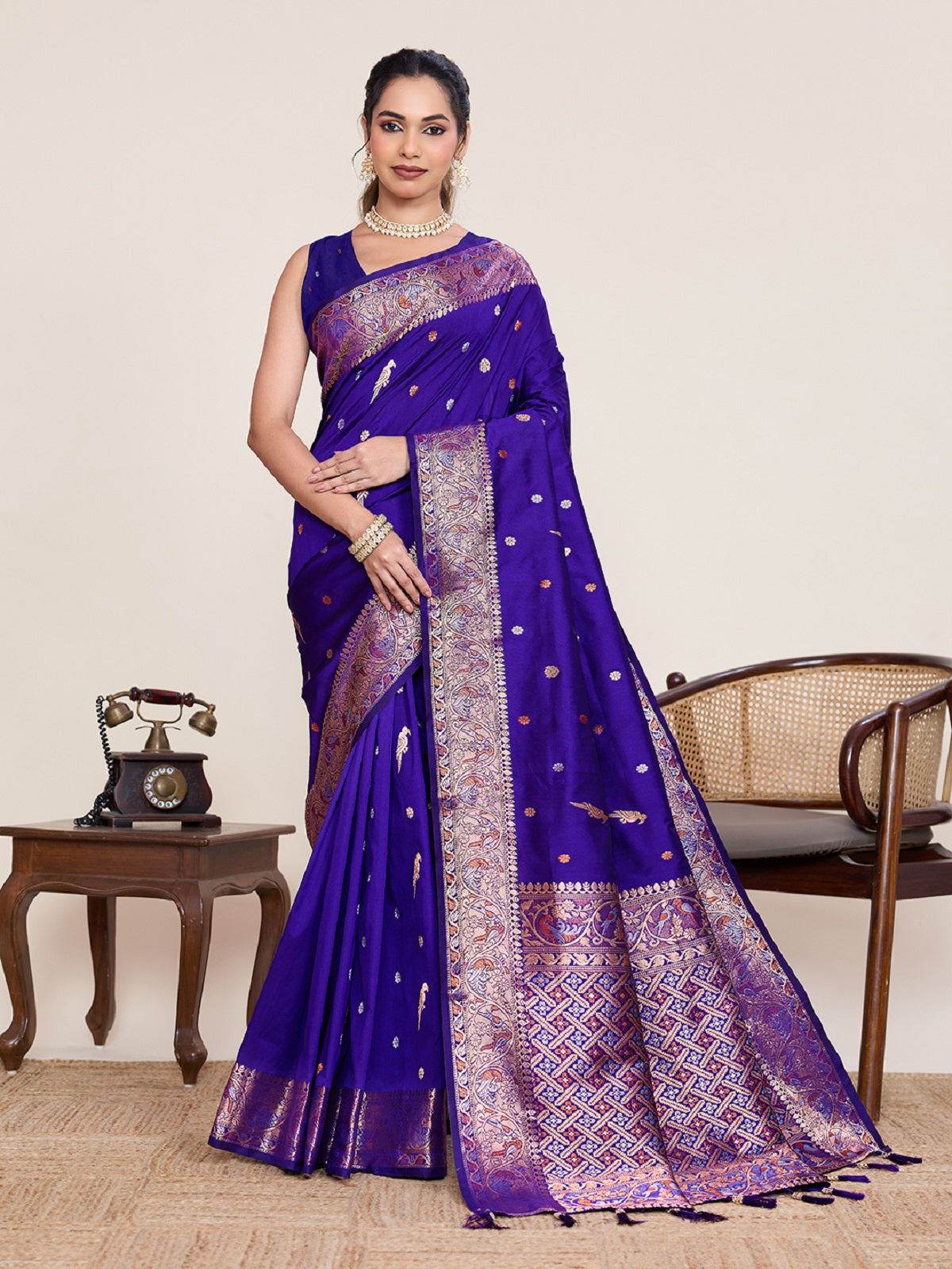 Blue Kanjivaram silk wedding saree with intricate silver and gold Jari weaving.