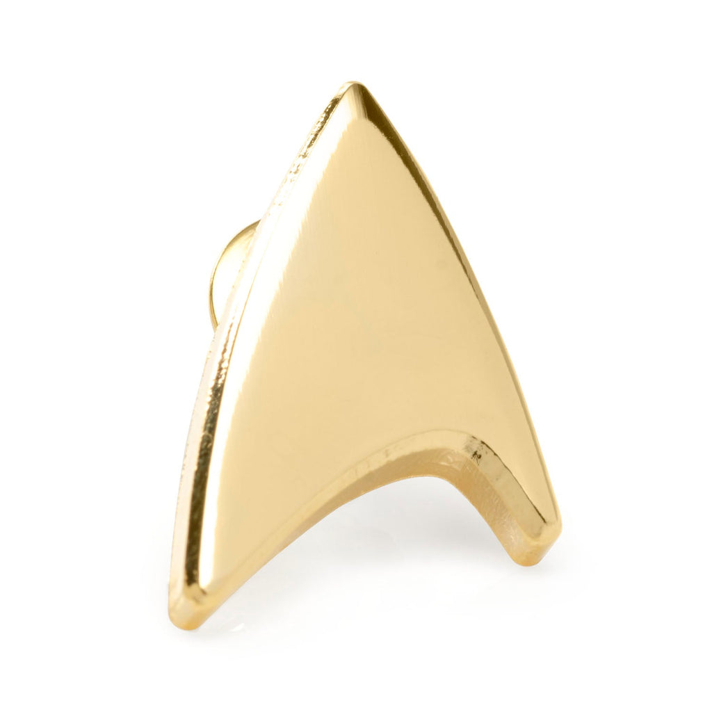 A gold-toned Star Trek Delta Shield lapel pin against a white background, featuring a secure back clasp.