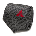 Close-up of a gray silk Star Trek necktie with Klingon script pattern and a red Klingon Empire pin.