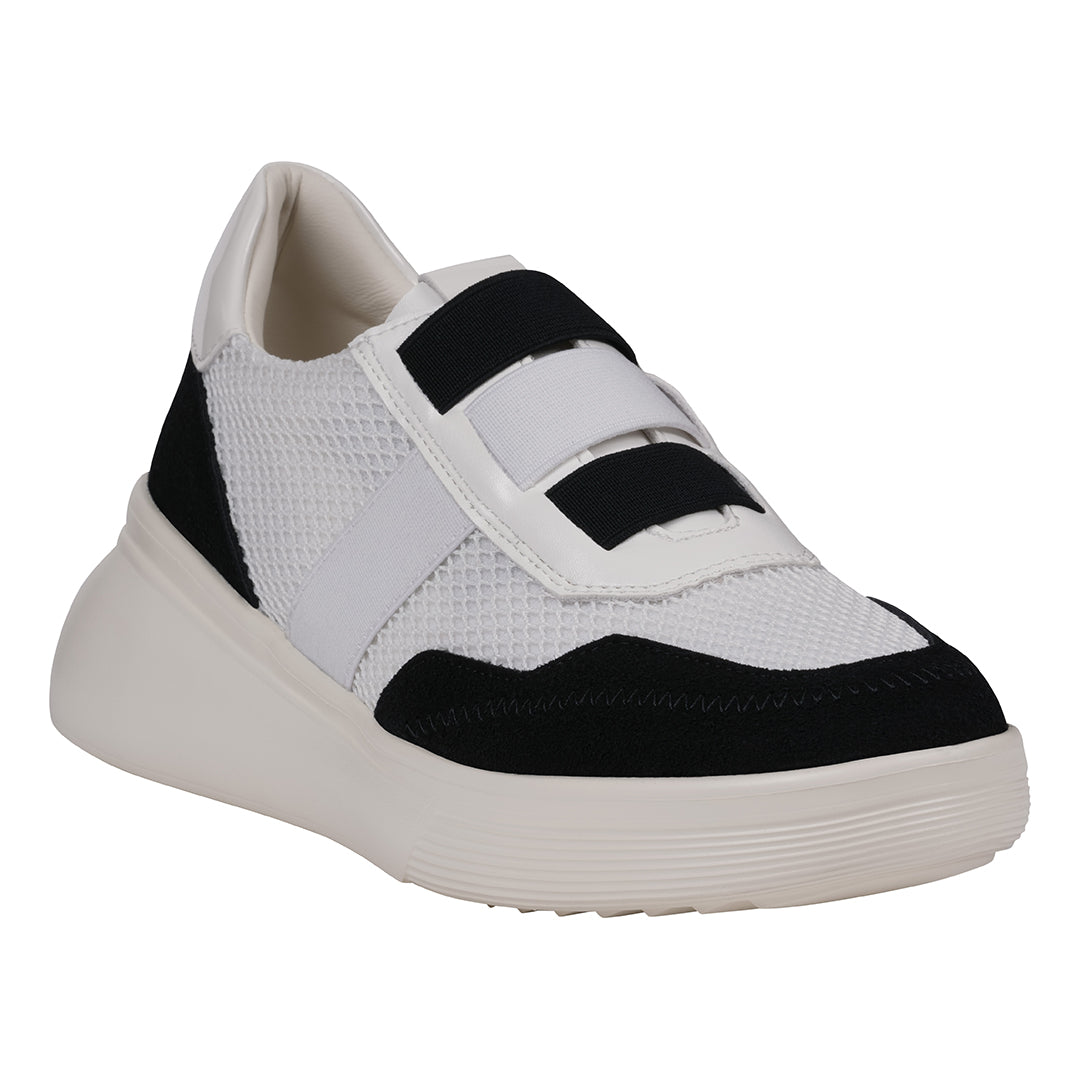 A pair of Women's Stefani wedge sneakers featuring a white and black mesh design with a platform sole.