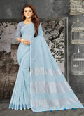 Elegant Sky Blue woven linen saree with contrast zari border and decorative tassels