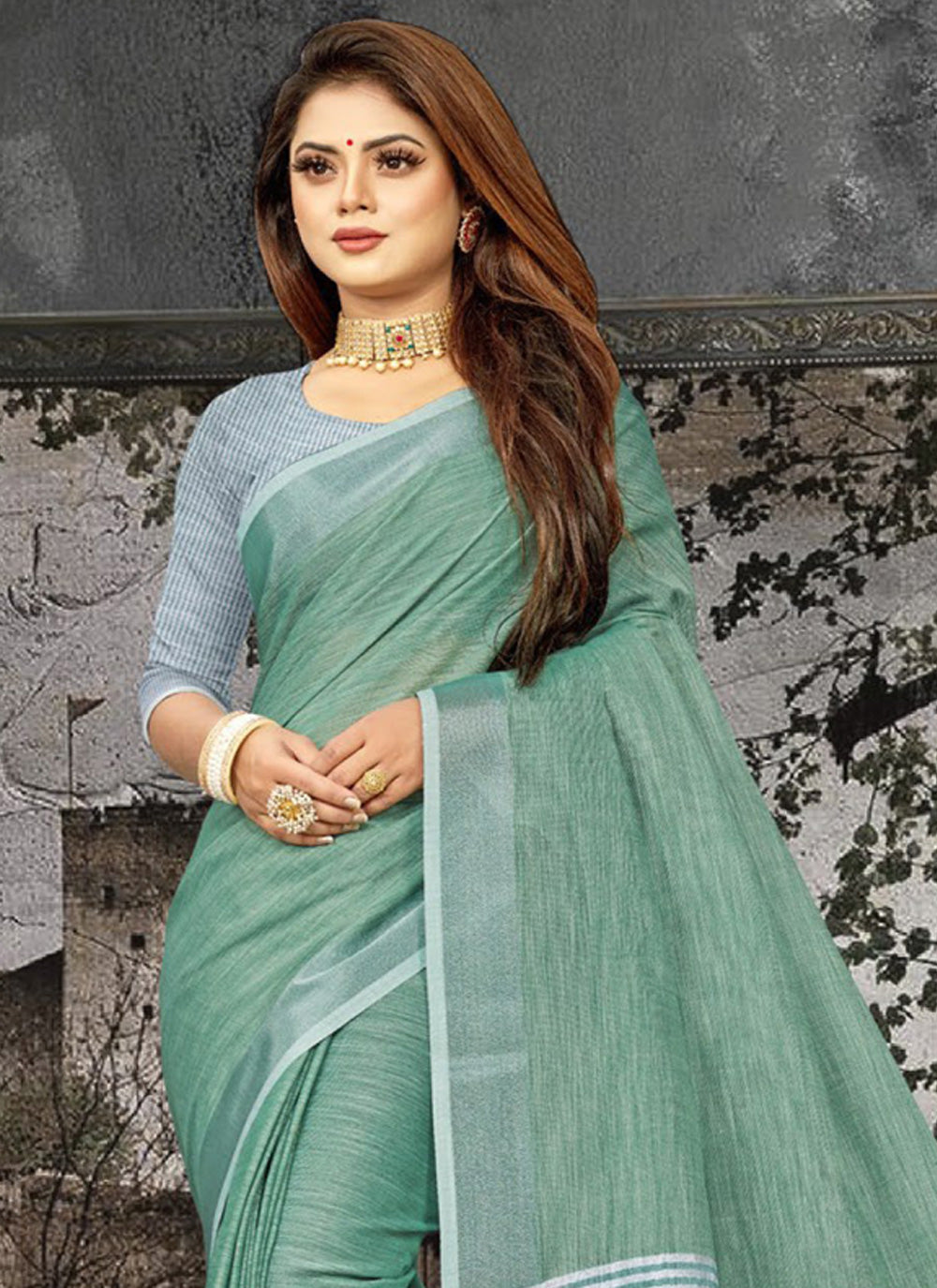 Sea Green Woven Linen Saree with Zari Border and Tassels