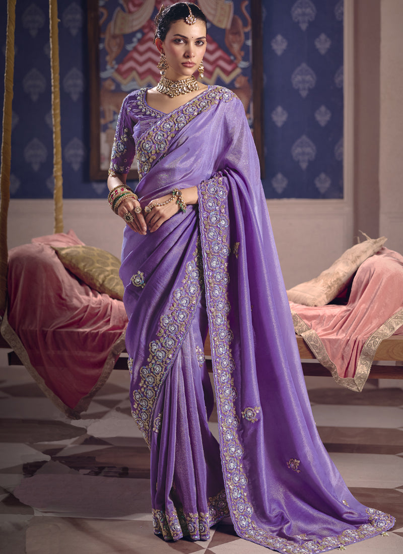 Regal purple silk embroidered saree with ornate lace border