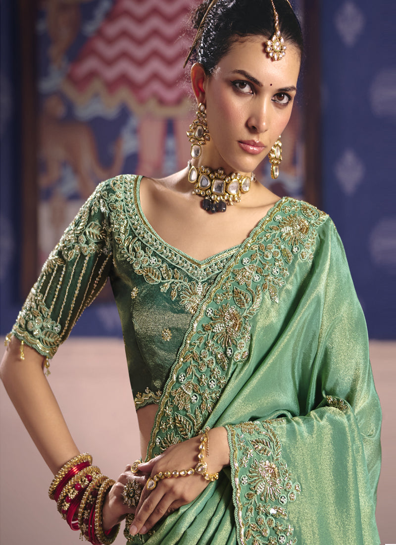 Dark Green Silk Saree with Heavy Embroidered Lace Border