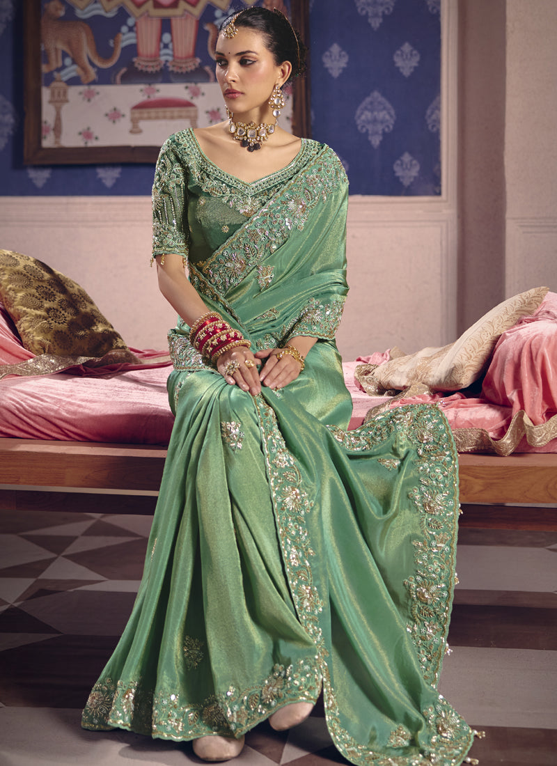 Dark Green Silk Saree with Heavy Embroidered Lace Border