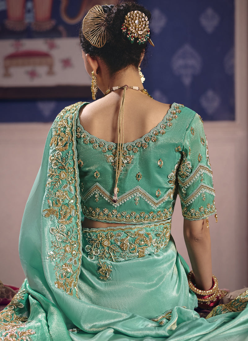 Turquoise Silk Embroidered Saree with Heavy Lace Border