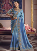 Sky blue silk embroidered saree with delicate heavy lace border