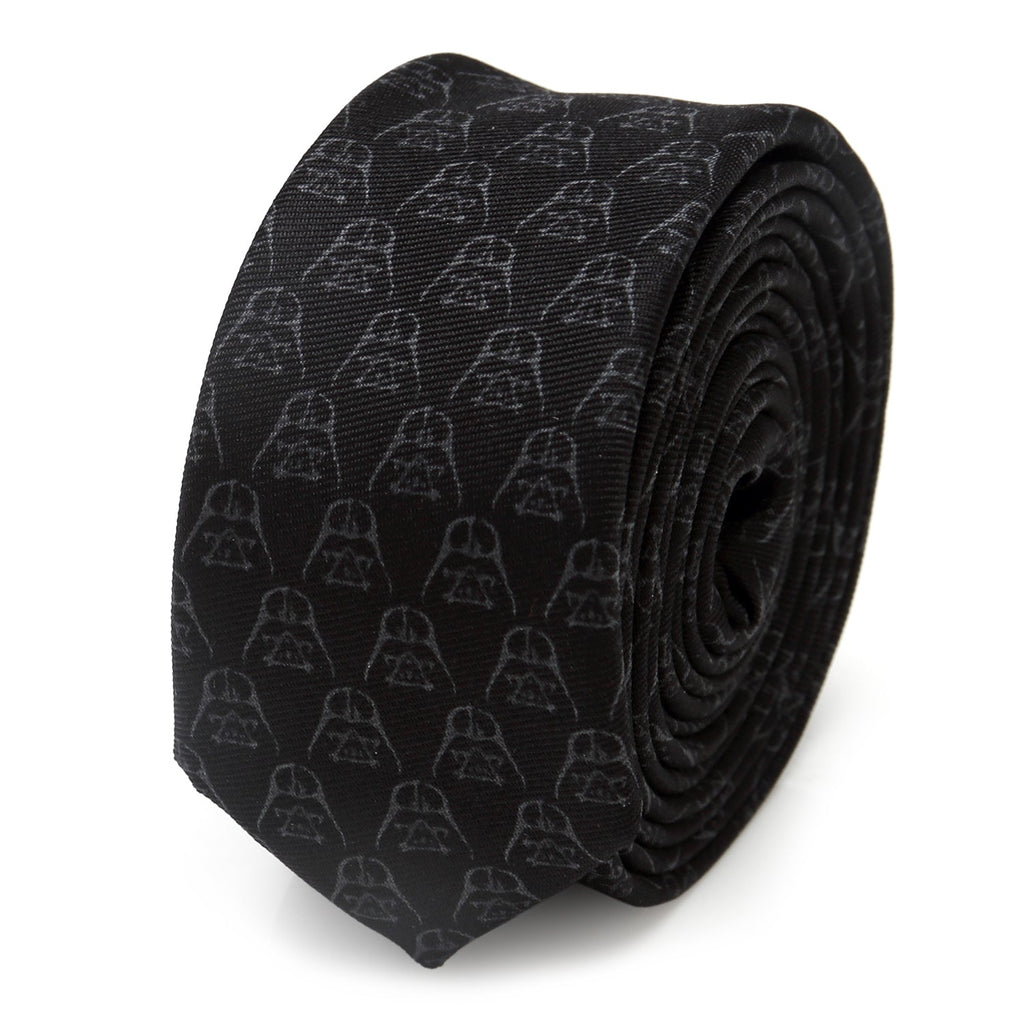 A black silk skinny tie with a subtle repeating pattern of Darth Vader helmet outlines.