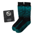 Pair of black and green Star Wars Boba Fett crew socks next to a Boba Fett crest lapel pin