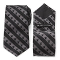 Star Wars Grogu striped necktie in black and charcoal gray featuring repeating Child icons.