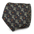 Close up of a black Star Wars necktie featuring sage green Grogu character patterns and orange and white dots.
