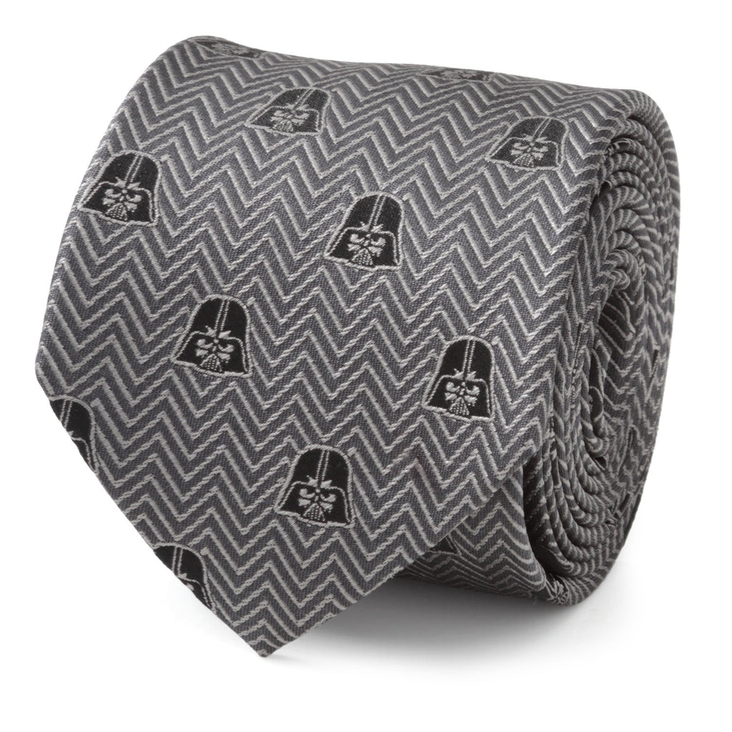 Close up of a gray and black herringbone patterned necktie featuring small Darth Vader helmet icons