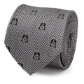 Close up of a gray and black herringbone patterned necktie featuring small Darth Vader helmet icons
