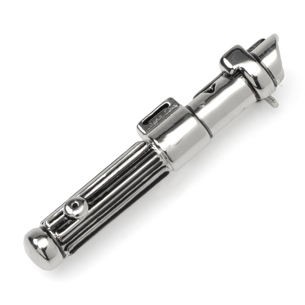 Close up of a metallic silver Darth Vader lightsaber shaped lapel pin pinned to a grey suit jacket lapel.