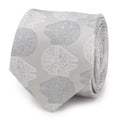 Close up of a gray silk tie featuring an embroidered Millennium Falcon pattern from Star Wars