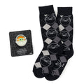 Star Wars Grogu charcoal gray argyle crew socks displayed next to a Grogu lapel pin on its backing card.