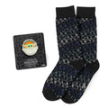 A pair of black crew socks with a repeating outline pattern of Grogu alongside a matching Star Wars Grogu enamel lapel pin.