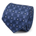 Close up of a navy blue Star Wars necktie featuring a repeating Grogu motif and white pin dots on a silk blend fabric.