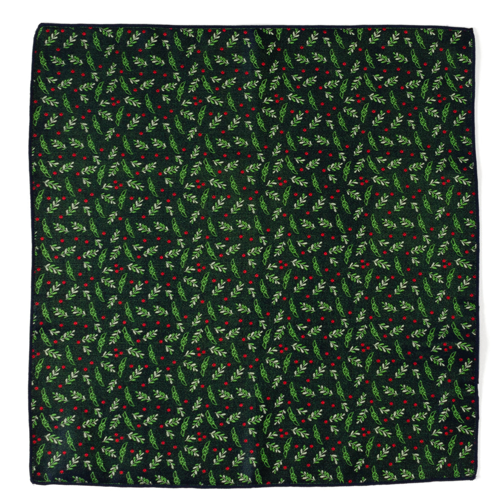 Navy blue silk pocket square featuring a repeating pattern of Grogu, green holly leaves, and red berries.