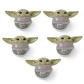 Set of five 3D Grogu button studs from Star Wars, showing his green face and large ears.