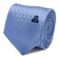 A blue silk necktie featuring a repeating tonal Stormtrooper helmet pattern and an embroidered black Darth Vader helmet.