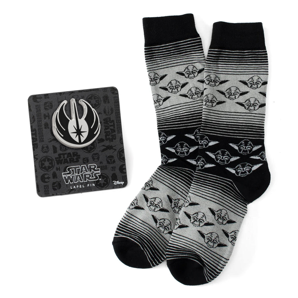Star Wars gift set including gray and black ombre pattern crew socks with Yoda print and a Jedi crest lapel pin.