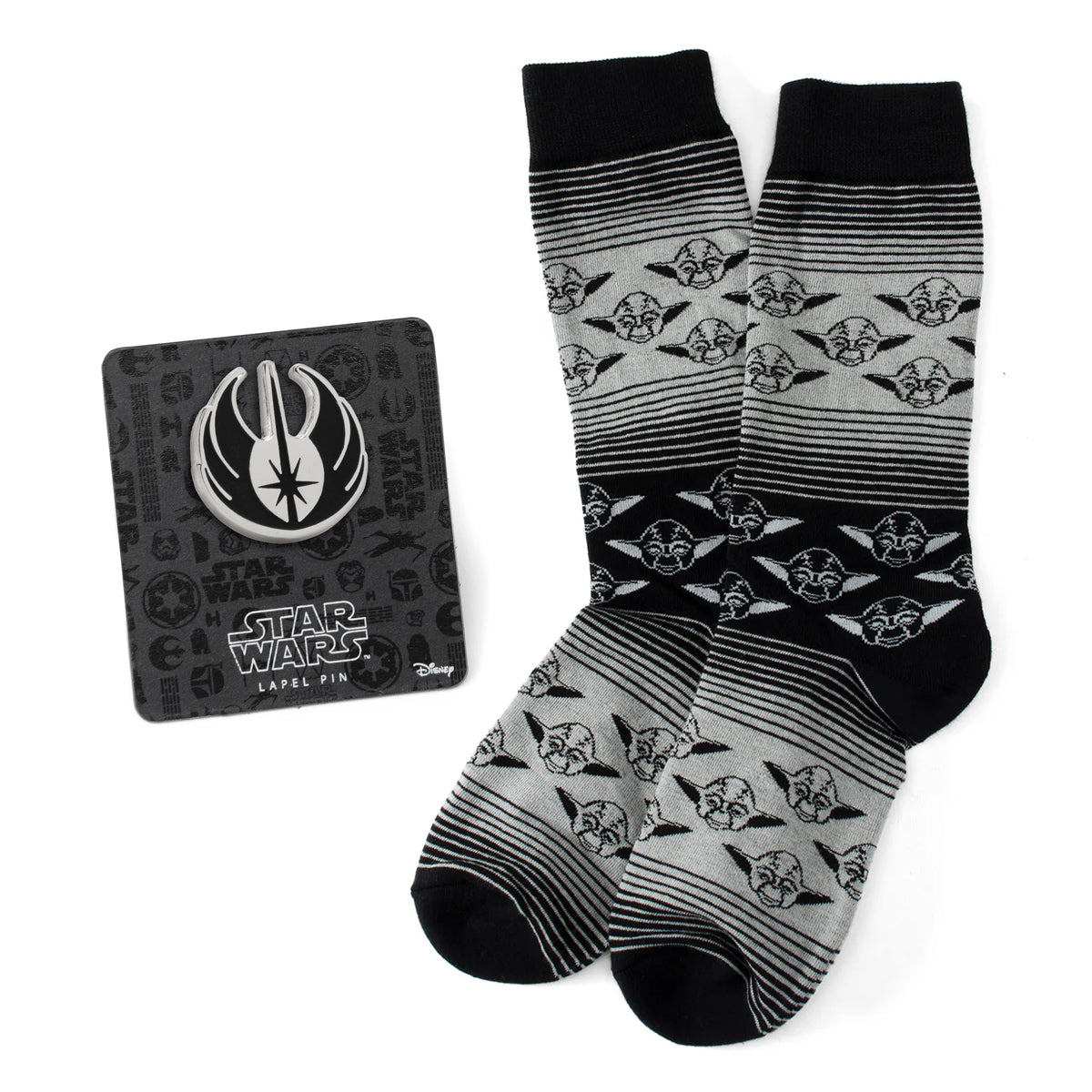 Star Wars gift set including gray and black ombre pattern crew socks with Yoda print and a Jedi crest lapel pin.